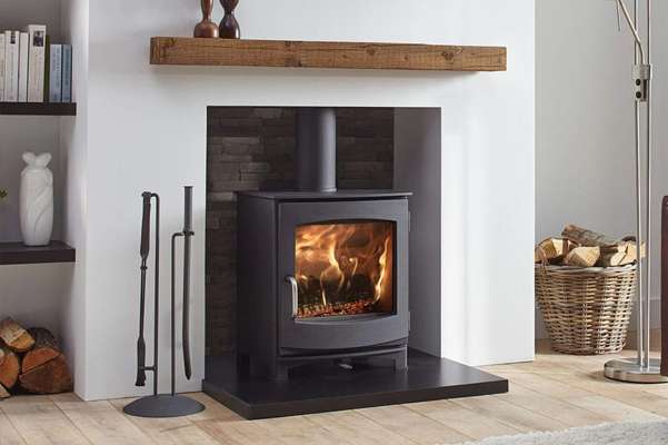 a dik geurts wood burning stove in a modern living room