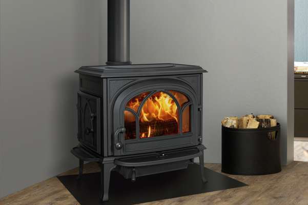 a jotul wood burning stove in a modern living room