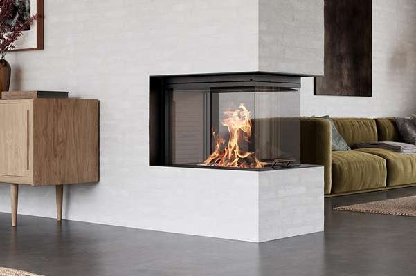 a rais wood burning stove in a traditionally decorated living room